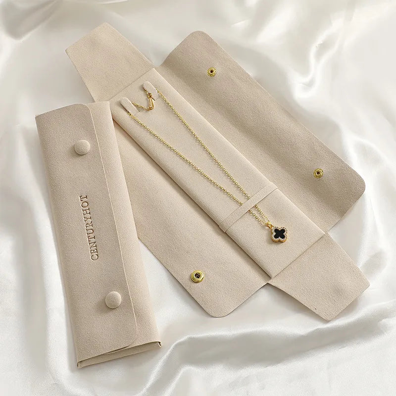 The Evie Necklace suede pouch open