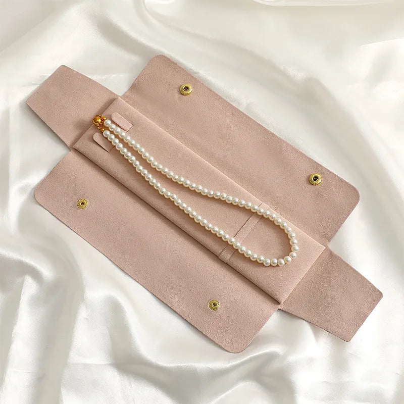 The Evie Necklace pink suede pouch